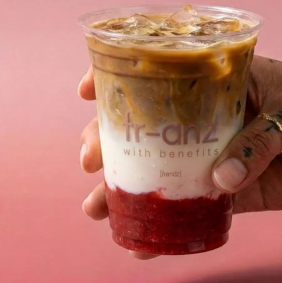 Strawberry latte layered over strawberry jam