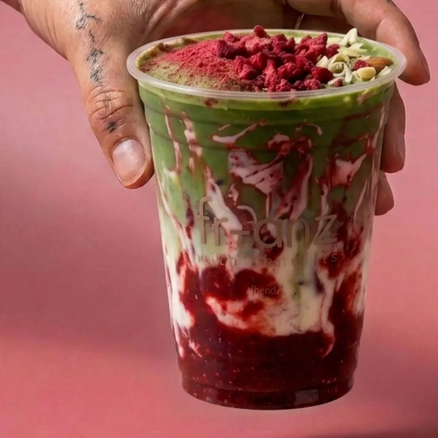 Raspberry White Chocolate Matcha topped with freeze-dried raspberries