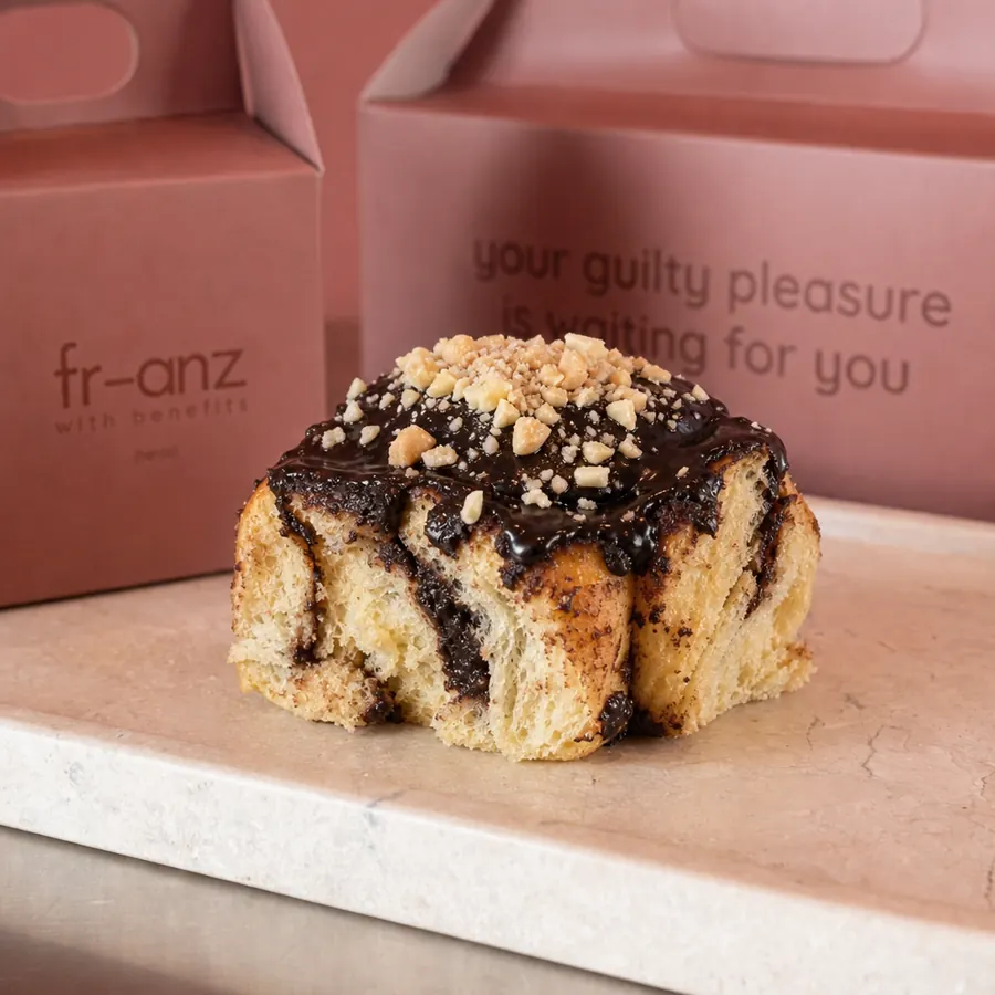 Dark chocolate cinnamon roll with roasted nuts