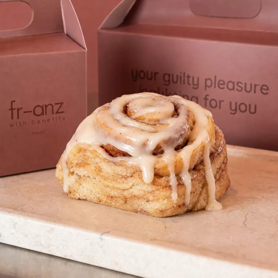Vegan cinnamon roll with white glaze