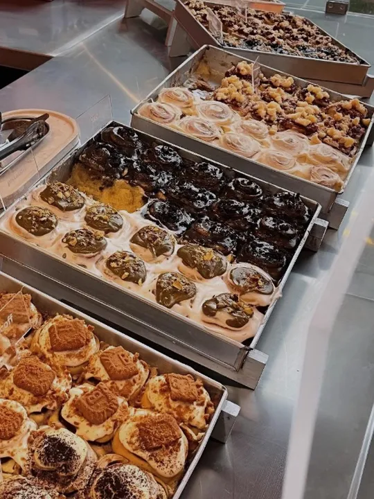 Metal trays of cinnamon rolls at fr-anz
